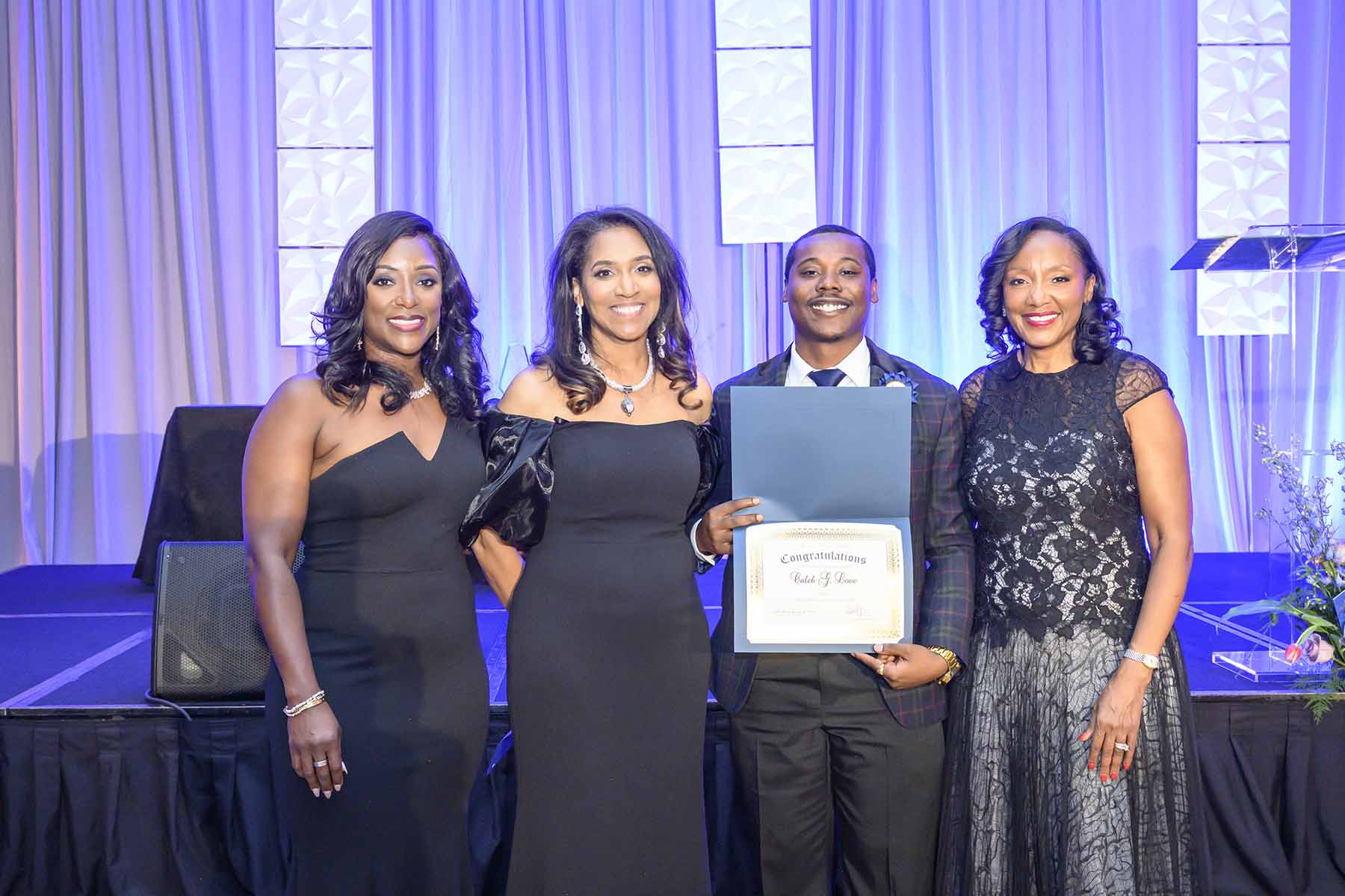 2025 SHB Scholarship Recipient Ashley Simon and Ball Chairs