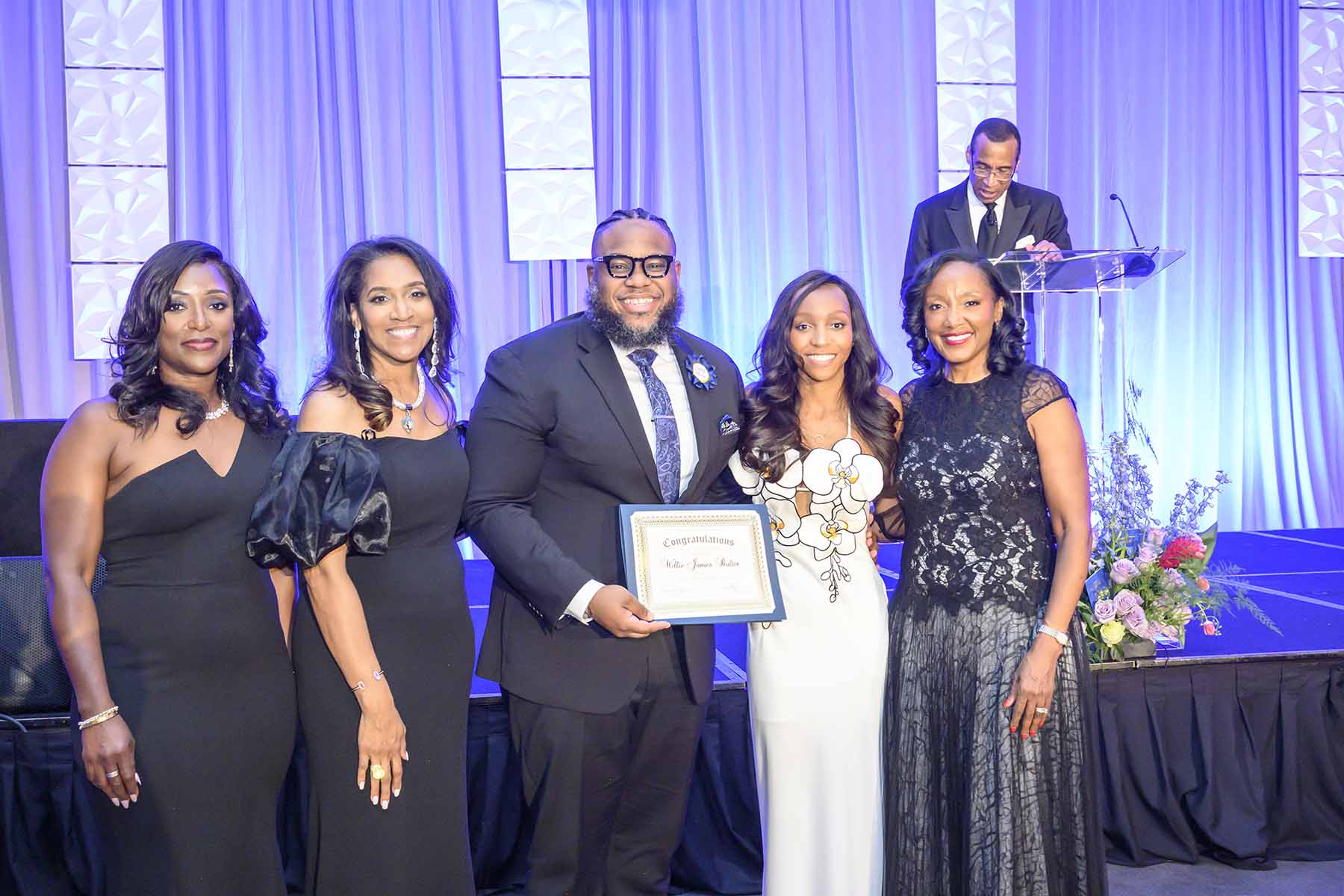 2025 SHB Scholarship Recipient Ashley Simon and Ball Chairs