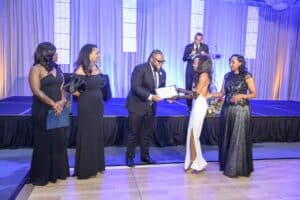 2025 SHB Scholarship Recipient Ashley Simon and Ball Chairs